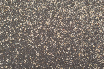 Sawdust on the pavement.