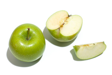 Ripe parts green apple Isolated on a white background. Healthy eating and dieting concept