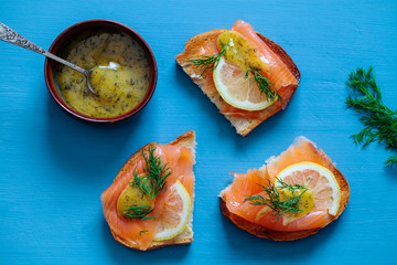 Nordic open sandwiches with salmon and mustard and dill sauce