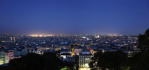 Fototapeta na wymiar Panoramic view from Montmartre in the evening on Paris