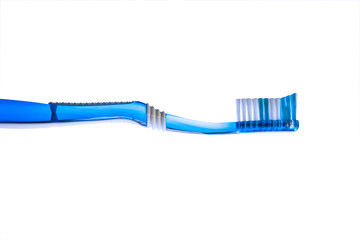 A isolated blue toothbrush