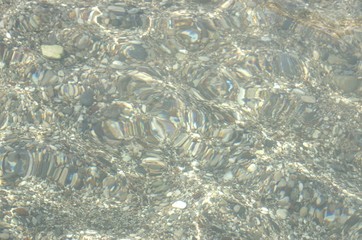Large sea stones in sea water close-up