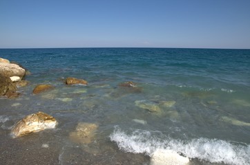 Large sea stones in sea water close-up
