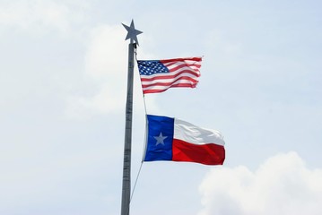 American and Texas Flag Flying
