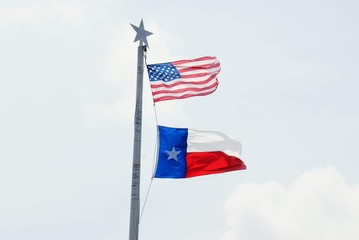 American and Texas Flag Flying