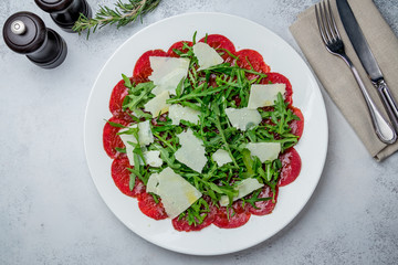 Beef carpaccio with Parmesan and arugula