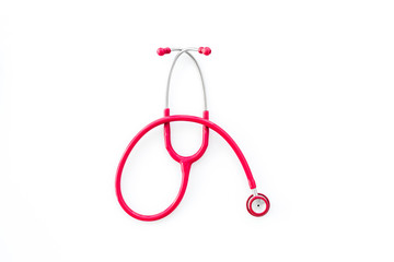 family doctor desk with stethoscope on white background top view mock up
