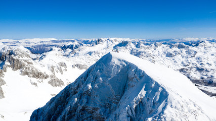 Aerial view of a mountains peak from a drone