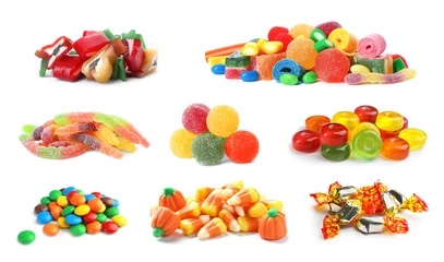 Fototapeten Set of different tasty candies on white background © New Africa