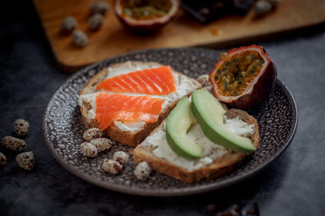 Launch with Dietary sandwiches with grain bread, cream cheese and avocado