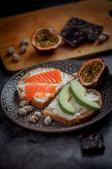 Launch with Dietary sandwiches with grain bread, cream cheese and avocado