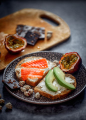 Launch with Dietary sandwiches with grain bread, cream cheese and avocado