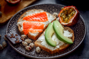 Launch with Dietary sandwiches with grain bread, cream cheese and avocado