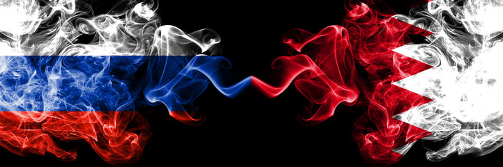 Russian vs Bahrain, Bahrani smoke flags placed side by side. Thick colored silky smoke flags of Russia and Bahrain, Bahrani