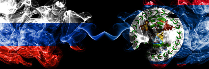 Russian vs Belize, Belizean smoke flags placed side by side. Thick colored silky smoke flags of Russia and Belize, Belizean