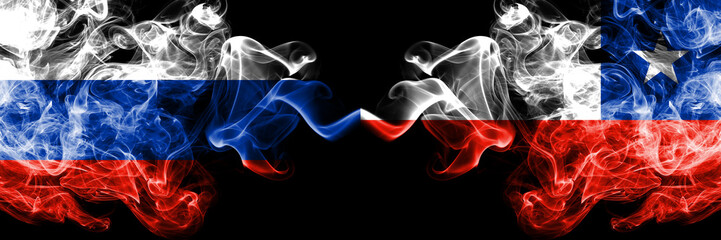 Russian vs Chile, Chilean smoke flags placed side by side. Thick colored silky smoke flags of Russia and Chile, Chilean