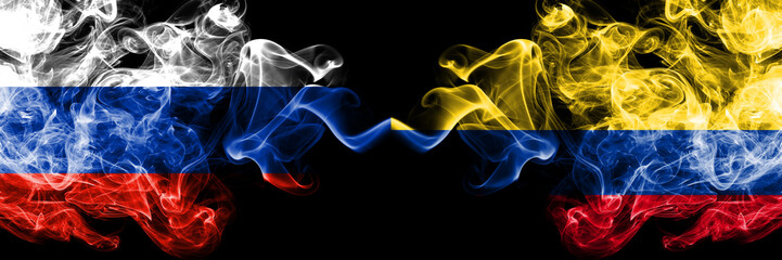 Russian vs Colombia, Colombian smoke flags placed side by side. Thick colored silky smoke flags of Russia and Colombia, Colombian