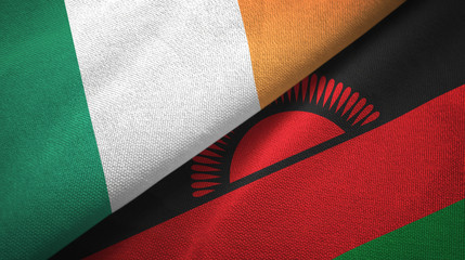Ireland and Malawi two flags textile cloth, fabric texture