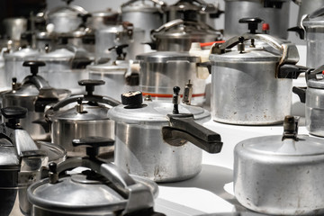 Antique pressure cookers built up in the kitchen