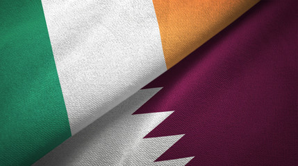 Ireland and Qatar two flags textile cloth, fabric texture