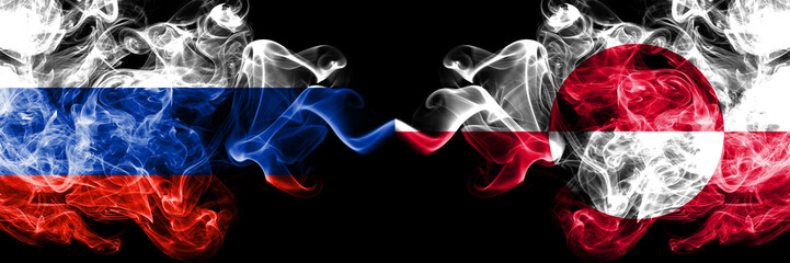 Russian vs Greenland smoke flags placed side by side. Thick colored silky smoke flags of Russia and Greenland