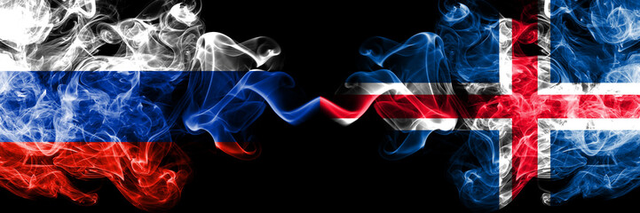 Russian vs Iceland, Icelandic smoke flags placed side by side. Thick colored silky smoke flags of Russia and Iceland, Icelandic