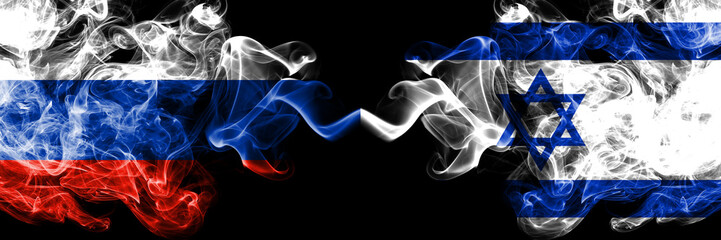 Russian vs Israel, Israeli smoke flags placed side by side. Thick colored silky smoke flags of Russia and Israel, Israeli