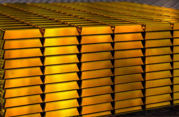 Stock of gold in bullion. The background is blurred on purpose. 3D rendering.