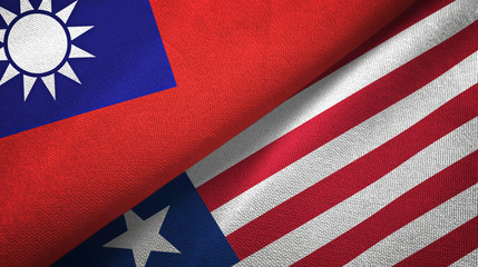 Fototapeta premium Taiwan and Liberia two flags textile cloth, fabric texture