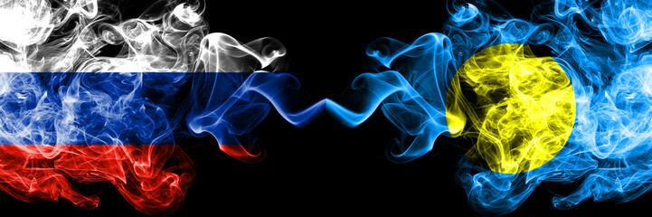 Russian vs Palau, Palaulan smoke flags placed side by side. Thick colored silky smoke flags of Russia and Palau, Palaulan