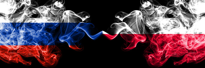 Russian vs Poland, Polish smoke flags placed side by side. Thick colored silky smoke flags of Russia and Poland, Polish