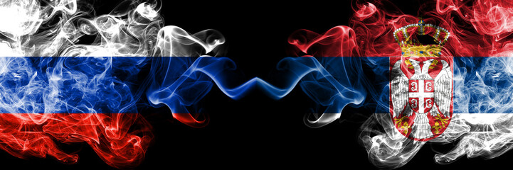 Russian vs Serbia, Serbian smoke flags placed side by side. Thick colored silky smoke flags of Russia and Serbia, Serbian