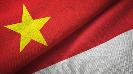 Vietnam and Indonesia two flags textile cloth, fabric texture