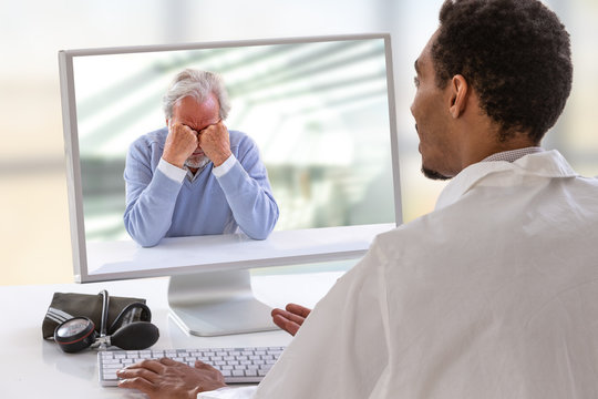 Psychologist Session On Computer Screen. Telemedicine Or Telehealth For A Depressed Senior Man