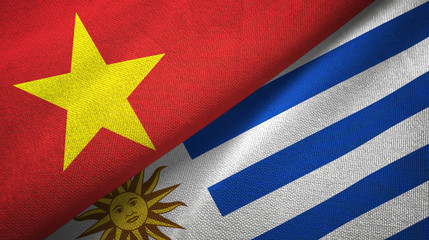 Vietnam and Uruguay two flags textile cloth, fabric texture