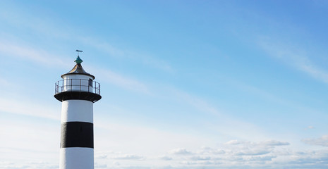 Lighthouse against a blue sky © Rawpixel.com