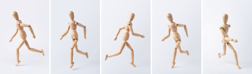 collection of wooden mannequin on white background