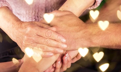 Man and Woman Hands Holding an Old Woman's Hands