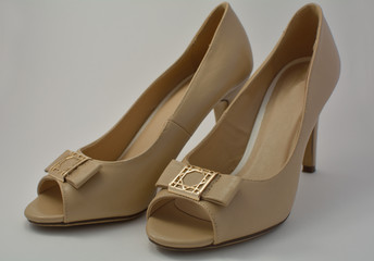A beige women shoes
