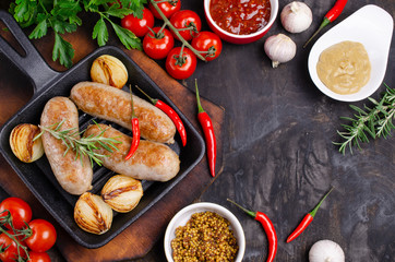 Fried sausages in a pan