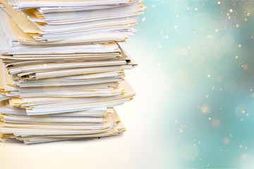 File folders with documents isolated on  background