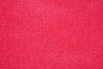 The texturThe texture of the knitted red fabric for the background e of the knitted red fabric for the background 