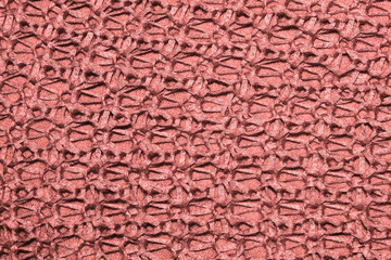 The texturThe texture of the knitted red fabric for the background e of the knitted red fabric for the background 