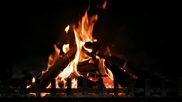 120fps Slow Motion Burning fire in dark fireplace