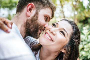 Fototapeta premium Happy Smiling Couple diversity in love moment together