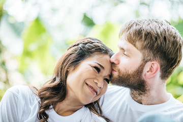 Fototapeta premium Happy Smiling Couple diversity in love moment together