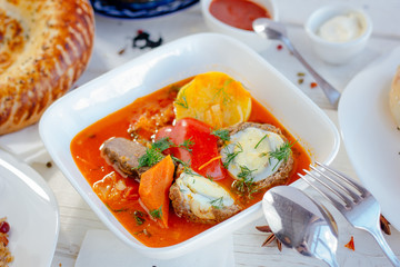 Dolma soup - greek, armenian and asian soup with meatballs and vegetables.