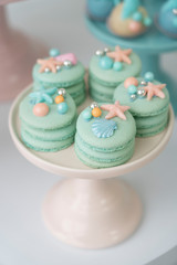 turquoise macaroonies with seashell