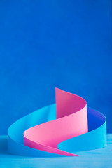 Papercraft shapes, pyramids, and curves in abstract paper sculpture. Design template with real 3D forms in traditional materials.