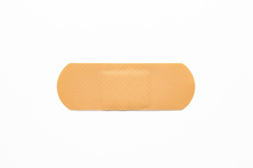 Medical adhesive plaster on white background. First-aid  